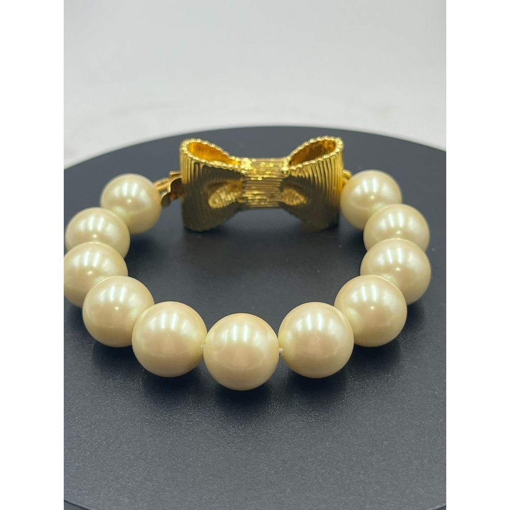 Kate Spade All Wrapped Up Pearl Gold Bow Bracelet - Picture 12 of 13